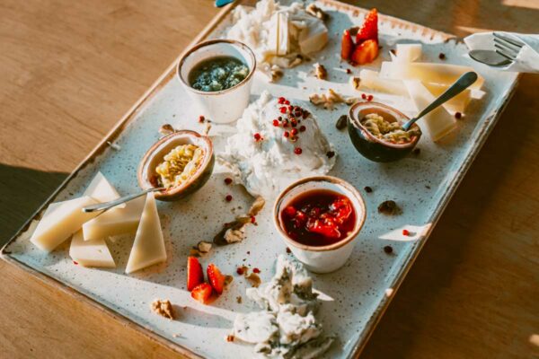 Naxian Cheese platter with assorted homade jams and fruit at Naxaki Beach Lounge & Restaurant in Naxos