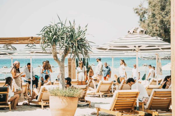 Social scene by the beach at Naxaki Beach Lounge Restaurant