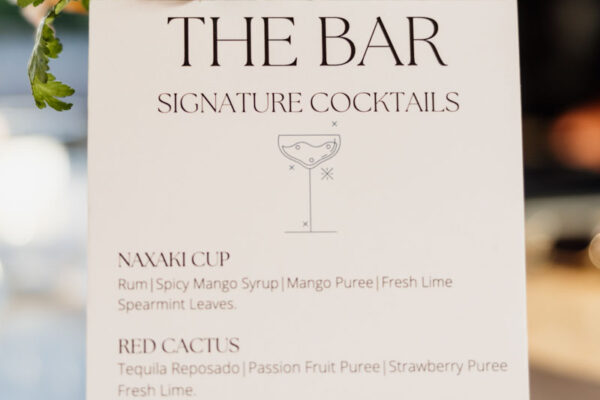 Signature cocktail menu displayed at Naxaki Beach Lounge wedding bar