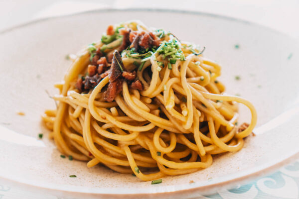 Spaghetti with anchovy and fresh herbs at Naxaki Beach Lounge & Restaurant in Naxos